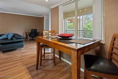 Dining space with light wood-style floors, ornamen