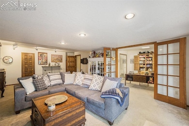 Living room featuring recessed lighting, carpet fl