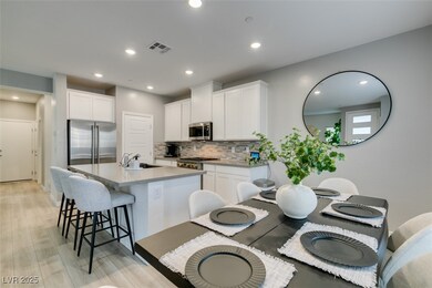 Kitchen with appliances with stainless steel finis