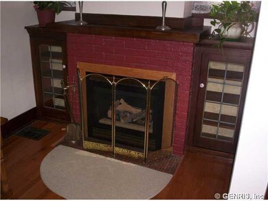 Living Room. Gas fireplace with built in storage t