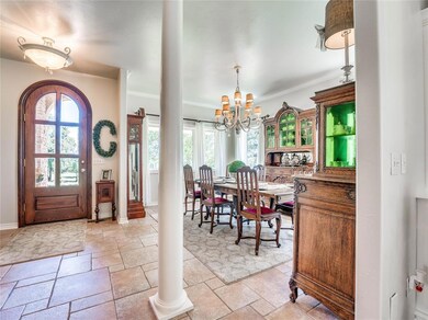 This beautiful entry area leads to formal dining on your left and executive office on the right.