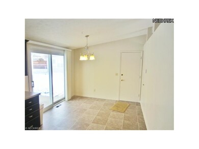 Vaulted dining area- not newer vinyl floor! Patio 