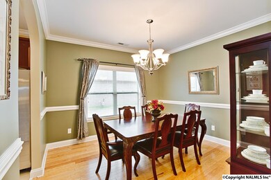 Formal Dining Room is located just off the Great Room and the Kitchen.