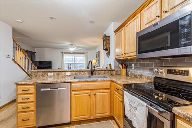 Tile backsplash, great appliances that stay with t