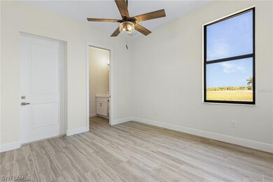 Unfurnished bedroom with light hardwood / wood-sty