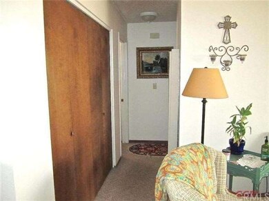 Hallway leading to bedrooms and bathroom. Gas wall