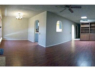 Living Room. Laminate wood floor through
