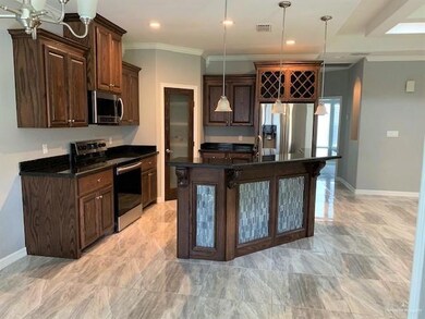 Kitchen offers Stainless smooth-top Stove & Microwaver.  Refrigerator negotiable