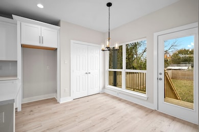 View from the dining area to the backyard and outs
