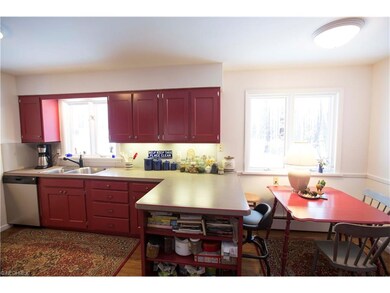 Eat in kitchen with a breakfast bar and lots of na