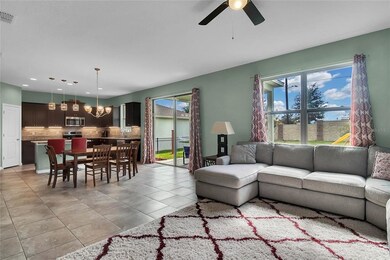 The sliding glass doors lead to the covered patio.