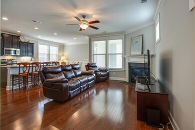 open floor plan living room with fireplace