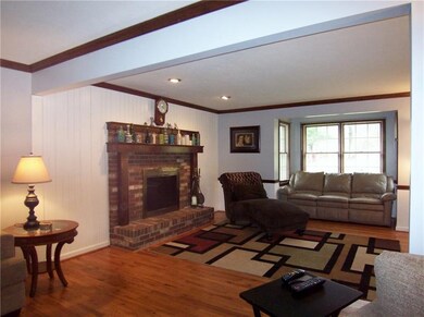 Family room with cozy fireplace.