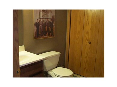 Bathroom. half bath + laundry on main level