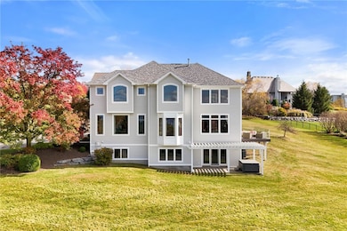 Walls of West facing windows frame the beautiful Cayuga Lake views.