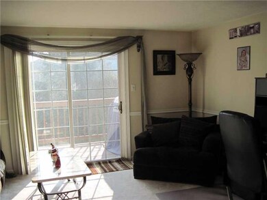 Living Room. Living room has sliding glass door fo