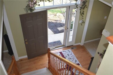 2 story foyer entry is open and airy