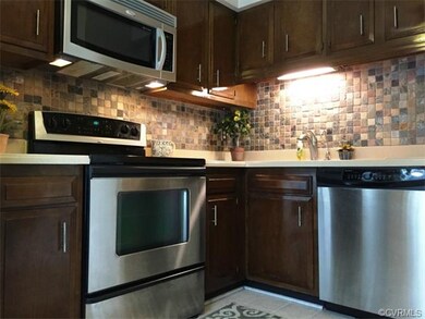 Gorgeous eye catching tile black splash and cabint