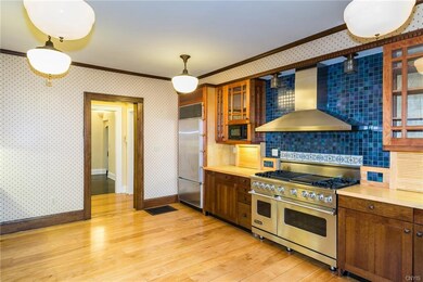 This wide angle of the vast kitchen shows how a fa