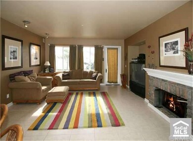 Living room with Fireplace leading to back yard