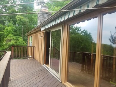 Back of the house is all glass leading out to the 