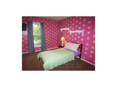 2nd Bedroom with new carpet & vinyl windows