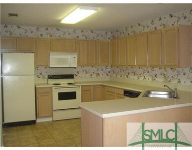 Kitchen. Fully equipped kitchen with white ceramic