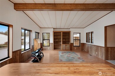 Family Room next to the Kitchen with an eating space.