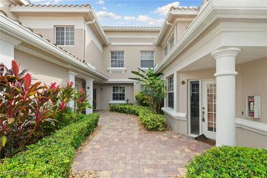 Doorway to property featuring stucco siding