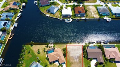 Drone / aerial view with a water view and a reside