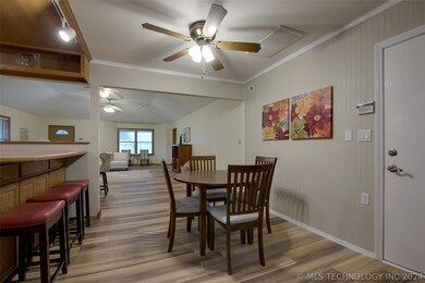 Breakfast nook. Newer luxury vinyl tile through mu
