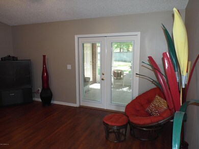 Family Room Opens to the Screened Lanai