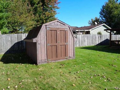 Shed fenced back yard