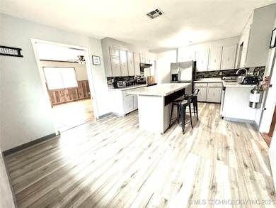 110 NW 3rd St, Checotah, OK 74426 - photo 5