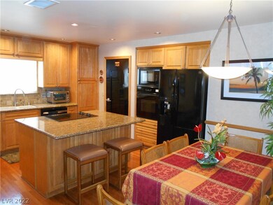 Granite counters with tumbled marble backsplash
