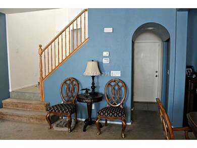 Family Room. Viewing stairs to upper level; entry