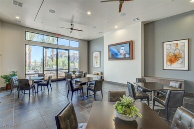 Dining room with a ceiling fan, recessed lighting,