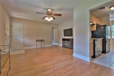 Ceiling fan, linen closet in living area...