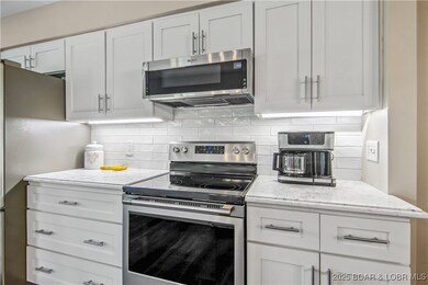 320 Waters Edge Dr unit 2A, Lake Ozark, MO 65049 - photo 3