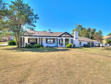 Front: The perfect location! Your new home offers two master suites, new windows, granite in kitchen and baths, refinished wood floors and more.