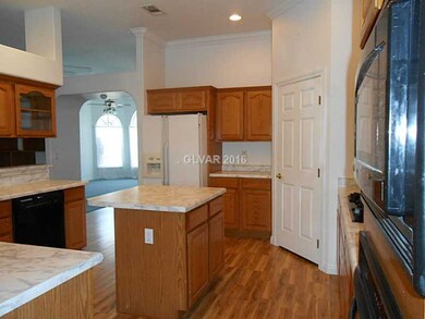 Property Photo. Kitchen offers custom cabinetry w/