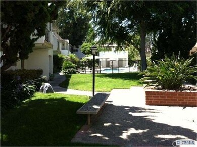 Walking up to your new home - lots of greenery, tr