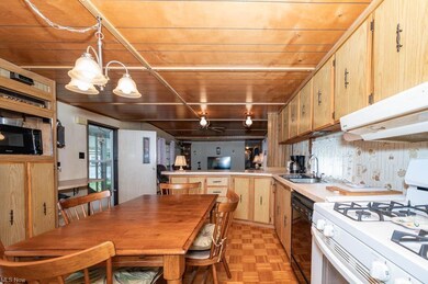 Kitchen featuring countertops light, light parquet
