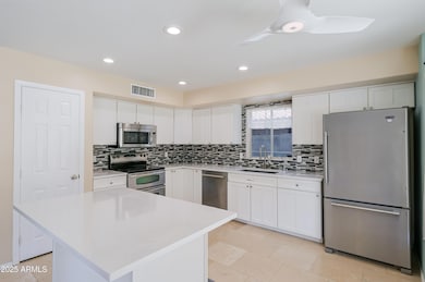 Kitchen Island/SS Appliances