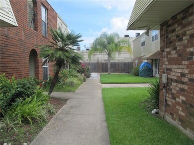 Walkway to the gated pool area.