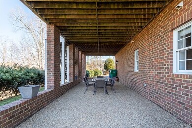 Covered patio space perfect for trikes and scooter