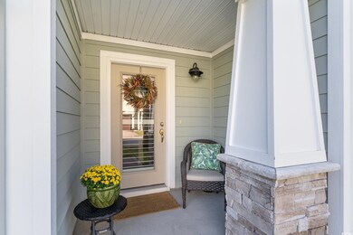 Entrance to property featuring a porch