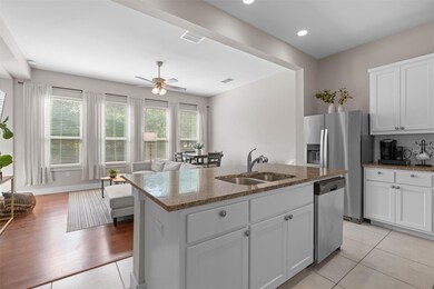 Kitchen featuring stainless steel appliances, a s