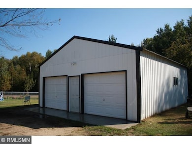 26 x 32 garage has new cement floor. Easily accomm