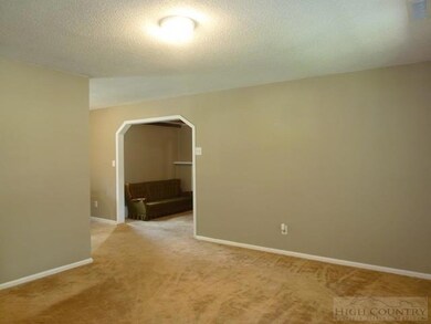 Living room looking towards the family room.  In v